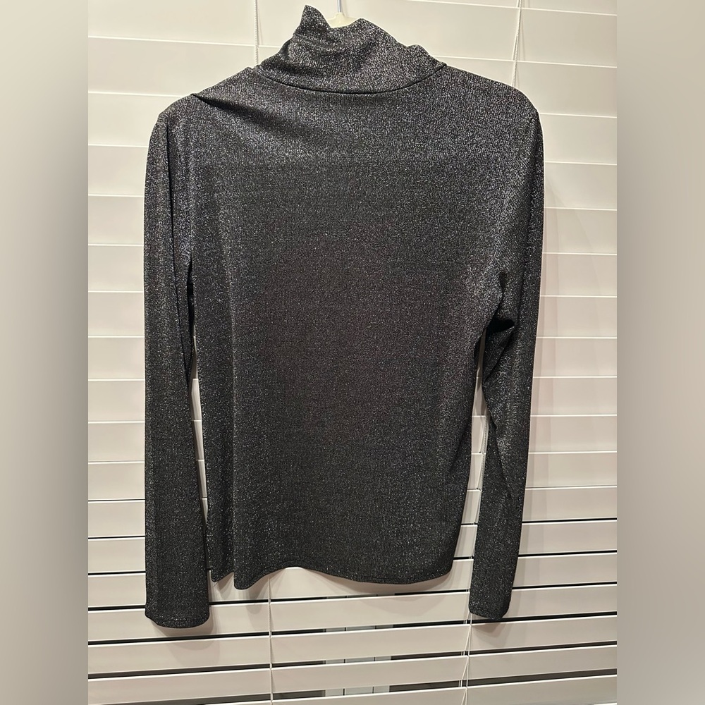 Never worn, but it doesn’t have tags.